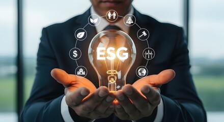 Businessman Holding Glowing ESG Light Bulb with Digital Network Icons