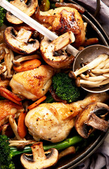 Family dinner. Roasted chicken with vegetables. Healthy eating.