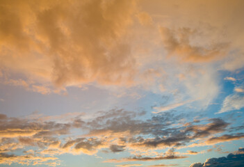 Yellow clouds. Beautiful sunset sky (background)