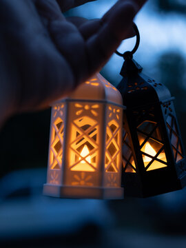 Ramadan Kareem greeting photo of beautiful Arabic lantern and flowers in the background representing the Islamic Holy Month.  