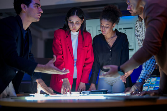 Future digital innovation and business strategy concept. Professional creative team brainstorming ideas for technology solution. Strategic planning for corporate growth and online customer experience. - Powered by Adobe