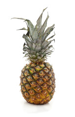 Fototapeta premium Whole ripe pineapple with green leaves.