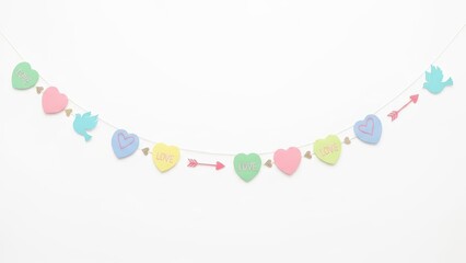 Pastel Conversation Heart Garland with Doves and Arrows on White Background for Valentine's Day