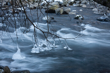 Long Exposure of Brembo River with Ice, Winter Landscape in Italy