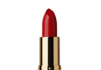 Vibrant red lipstick with golden case