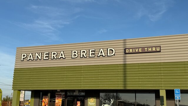Hattiesburg, MS, USA - 01 05 2026: The logo of Panera Bread on a restaurant in the city of Hattiesburg, MS.