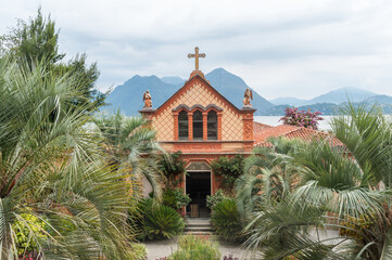 View of the Church of Isola Madre, located within the botanical garden of the Borromeo Palace on Lake Maggiore, in the municipality of Stresa, province of Verbano-Cusio-Ossola, Piedmont, Italy.