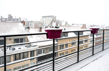 Snow-covered terrace in residential area