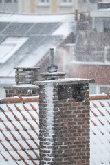 Chimney smoke during harsh winter conditions, Jette
