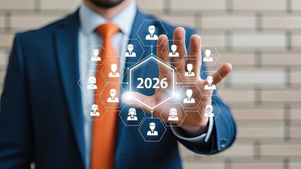 Businessman interacting with futuristic network interface for 2026