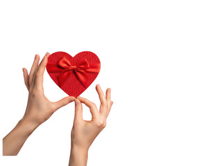 Two hands holding a red heart with a bow isolated on transparent background for valentines day or love concept