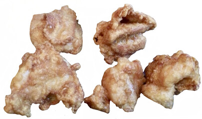 Crispy Japanese-style fried chicken (Karaage) or boneless nuggets, golden brown and crunchy. Isolated on white for food menu or culinary design