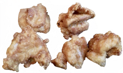 Crispy Japanese-style fried chicken (Karaage) or boneless nuggets, golden brown and crunchy. Isolated on white for food menu or culinary design