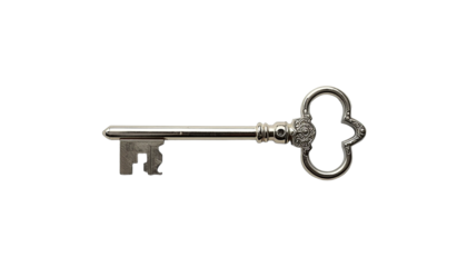 A vintage metal key with an ornate bow resting against a black background on transparent background