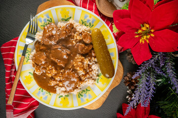 Chunky beef stew with savory sauce, served with bulgur groats.