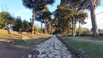 Walking on the ancient Appian Way in Rome, Italy