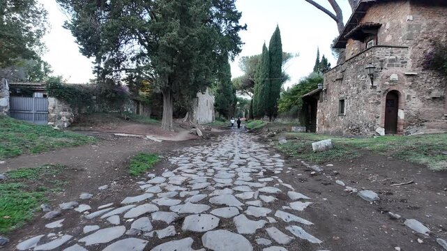 Appia Antica in Rome. Walking on the ancient Appian Way in Rome, Italy