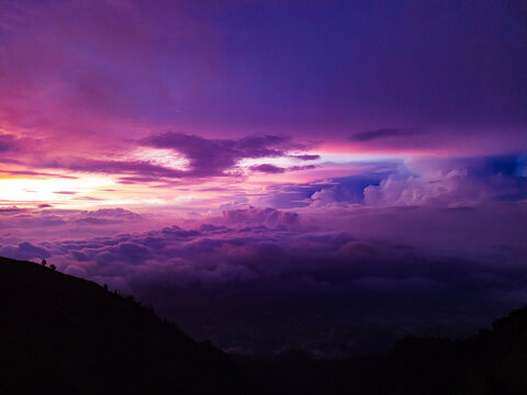 The purple sunset view is so iconic, dramatic, and beautiful that it has become a characteristic of Mount Merbabu, Indonesia.