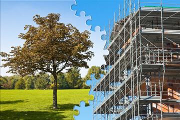 Building a new city - construction industry concept with a rural scene with lone tree and metal scaffolding on a construction site against a vacant land - concept in jigsaw puzzle shape