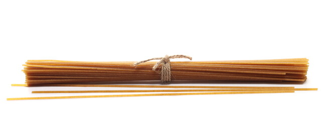 Integral uncooked spaghetti, organic whole wheat pasta isolated on white 
