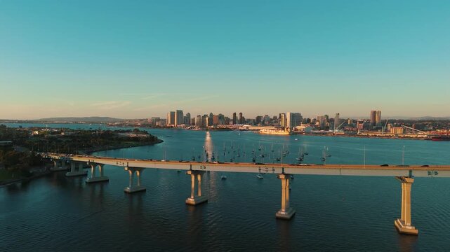 The city of san diego from Coronado California Bridge at Sunset Golden Hour