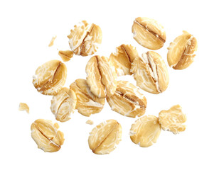 Falling oat flakes isolated on white background, cutout