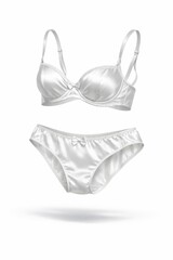 Elegant white satin bra and matching briefs hover over a light background, showcasing lustrous fabric and refined design ideal for luxury lingerie promotions and bridal marketing.