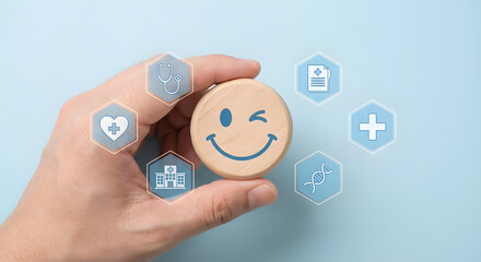 Smiling wooden face in hand with healthcare icons