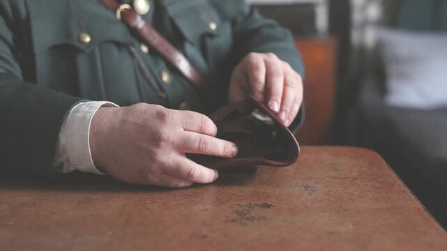 Details of policeman in uniform of 1920s in slow motion