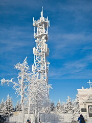 Polish mountains (Góry Sowie) covered by the snow. View on communication tower © Jakub