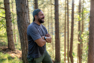 Hiker in a coniferous forest. © Gennaro Leonardi