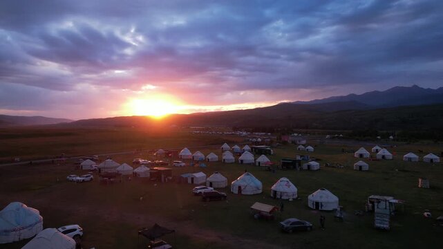 Xinjiang Yurt Camp Sunset - Traditional Nomadic Settlement Landscape