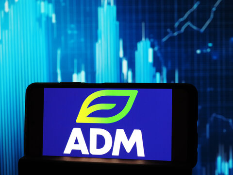 In this photo illustration,  Archer Daniels Midland Company (ADM) logo seen displayed on a smartphone.