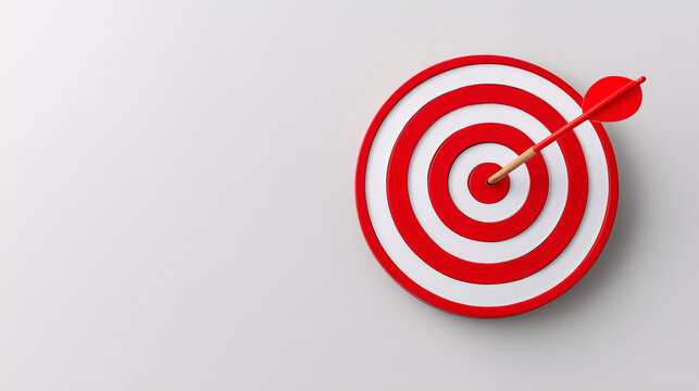 An isolated red and white target on a white background with a dart in the center; the minimalist composition emphasizes the goal symbolism and visual clarity.