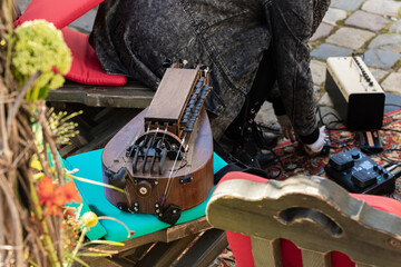 music instrument checking hurdy gurdy performance preparing process by male person with his hands artistic activity concept