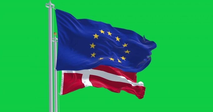 Flags of Denmark and of the European Union waving isolated on green background