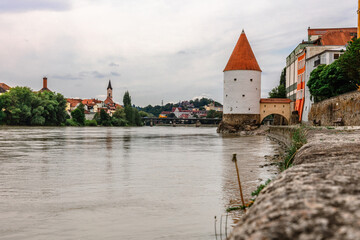 Panoramic view Schaibling Tower and promenade on river Inn, Passau, Lower Bavaria, Germany.