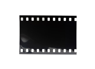 Piece of dark unexposed slide film on transparent png background.