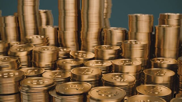 Bitcoin gold coins stacked in rising piles with a smooth horizontal panning motion. Cryptocurrency loop for banking, strategic crypto reserve, investment, and digital wealth concepts.