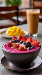 Pink Pitaya Smoothie Bowl with Fresh Berries and Iced Coffee