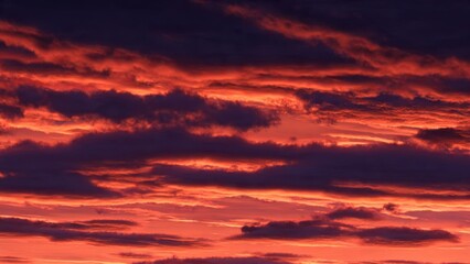 Obraz premium Fiery Sunset Clouds