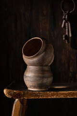 Ceramic kitchen pots on an old bench