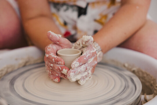 Hands Throwing Pottery