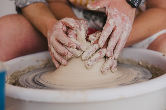 Hands Throwing Pottery