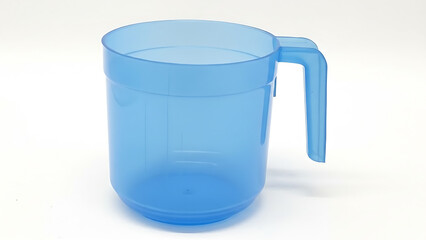 Transparent blue plastic measuring mug with handle isolated on white.