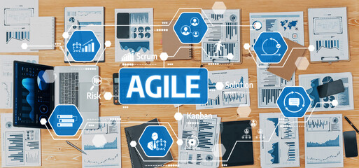 A vibrant workspace showcasing the concept of agile project management, featuring charts, graphs, and digital tools that support collaboration and strategic planning. Amity