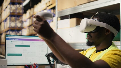 Black warehouse clerk uses virtual reality headset for online shopping orders, preparing cargo goods from inventory and monitoring parcel status on pc software. Order processing. Camera A.