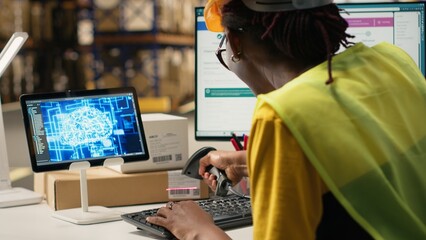 Woman uses AI-generated software for order processing automation, advanced neural networks cloud computing system ensures parcel tracking with a computer in warehouse with racks. Camera B.