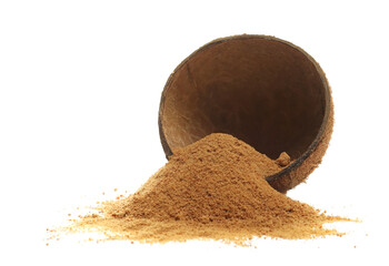 Coconut sugar pile with shell half used as bowl isolated on white background, side view