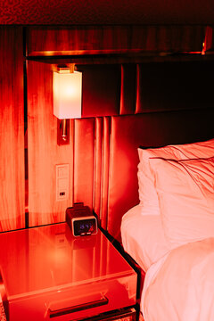 empty bed , red flash light